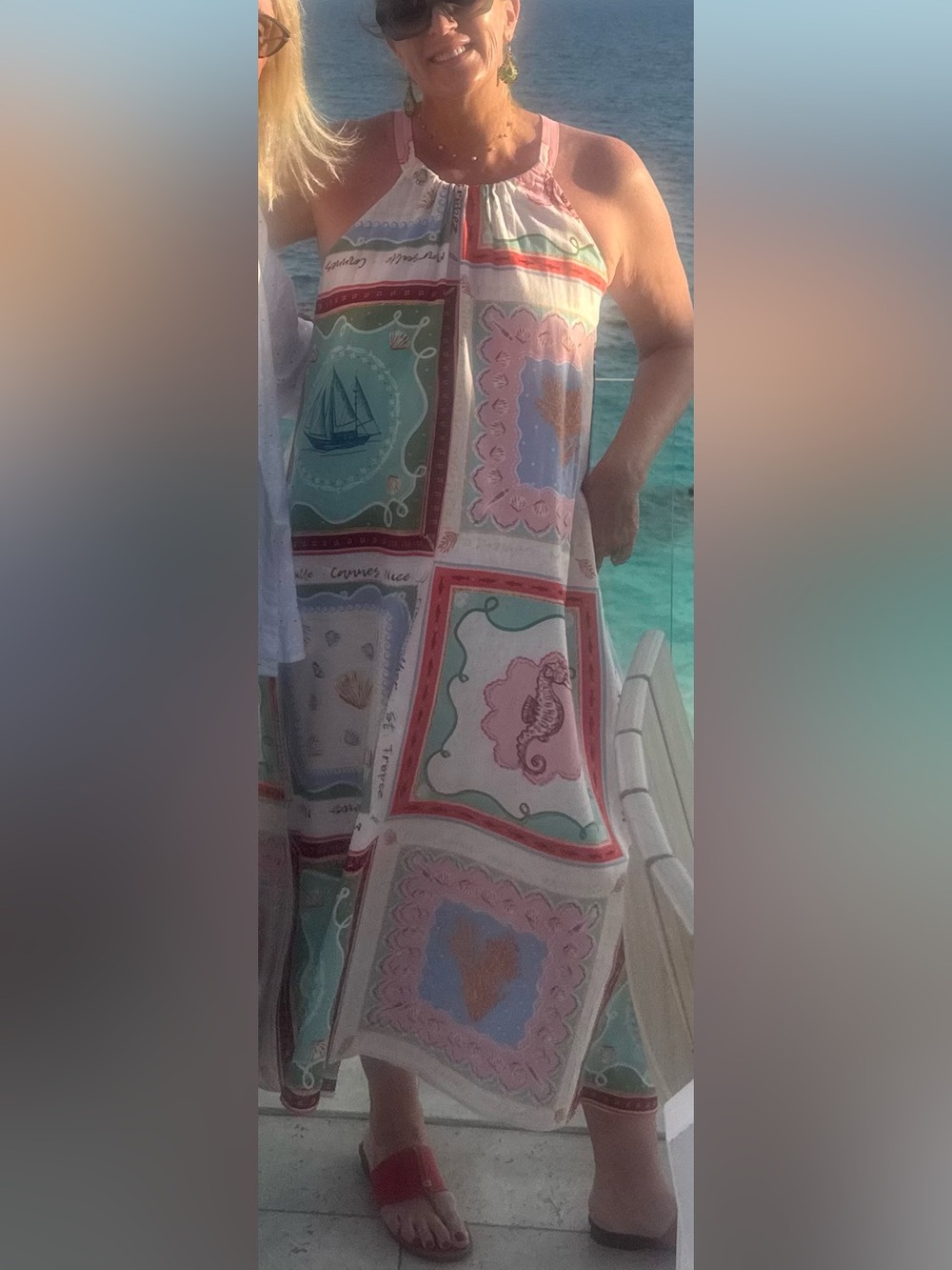 LOFT Multicolor Halter Maxi Dress with Red and Teal Accents.
Size M